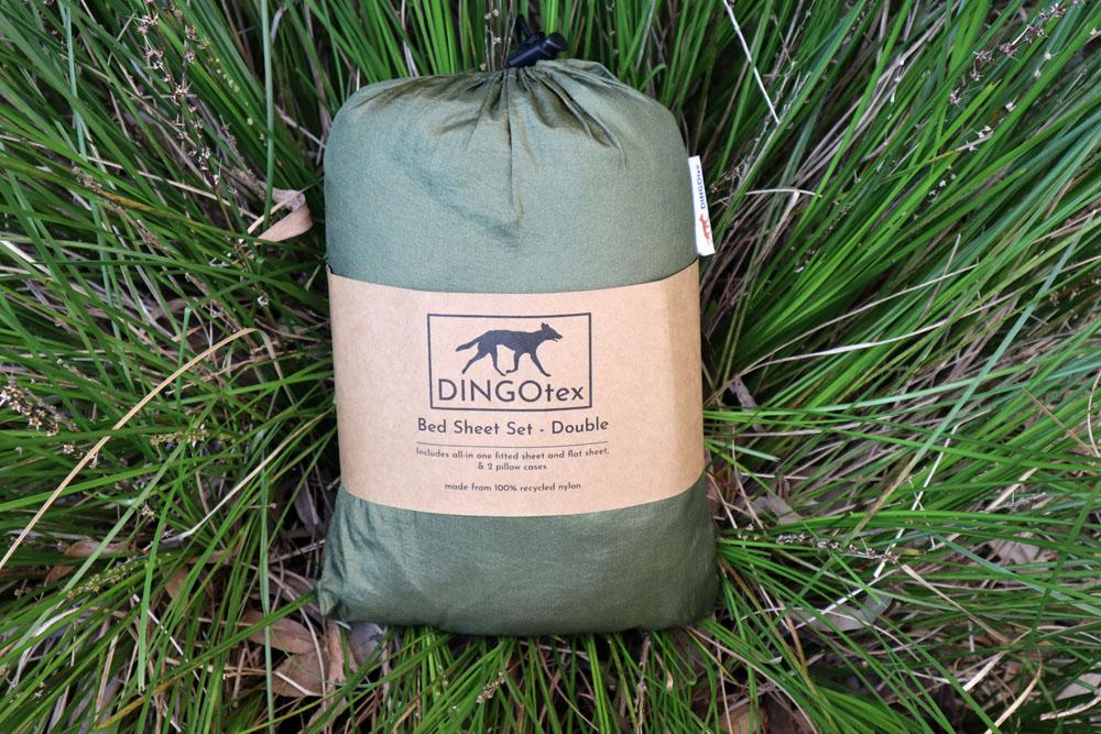 eco-friendly travel sheet on green grass